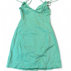 Green Princess Polly mini dress with adjustable strap. Size 4.